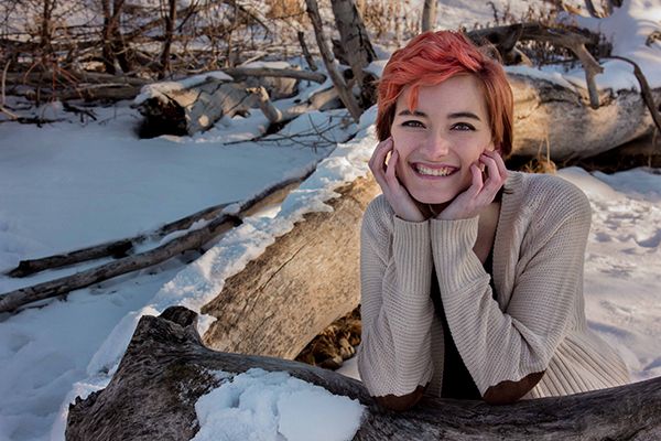 girl posing in snow setting